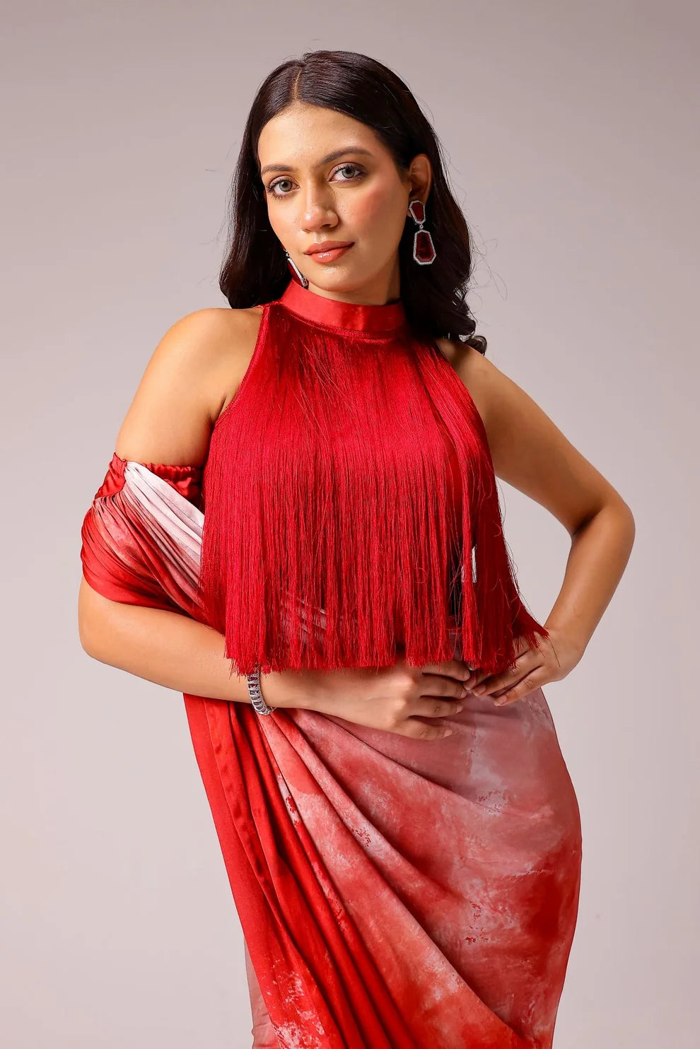 Rosette draped saree with fringe blouse