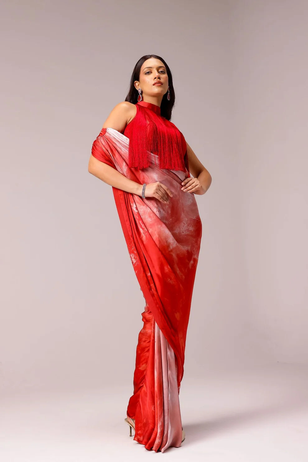 Rosette draped saree with fringe blouse
